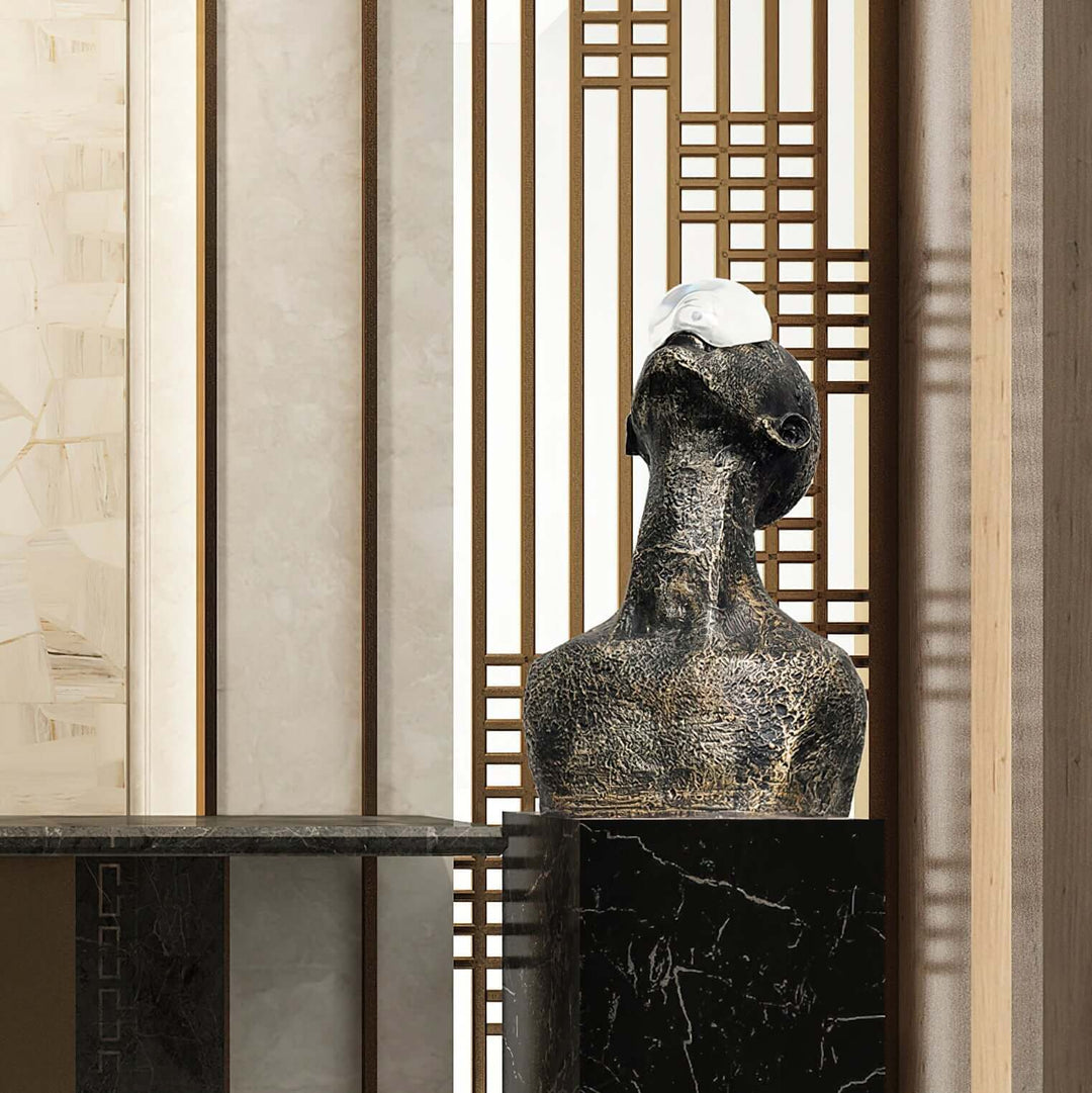 Zoreva resin sculpture displayed as a decorative ornament in a modern living room setting, blending Art Deco style.