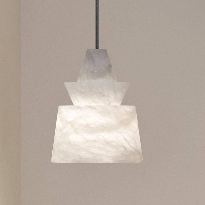 Alabaster pendant light featuring a unique layered design, ideal for mid century modern decor as a small hanging light fixture.