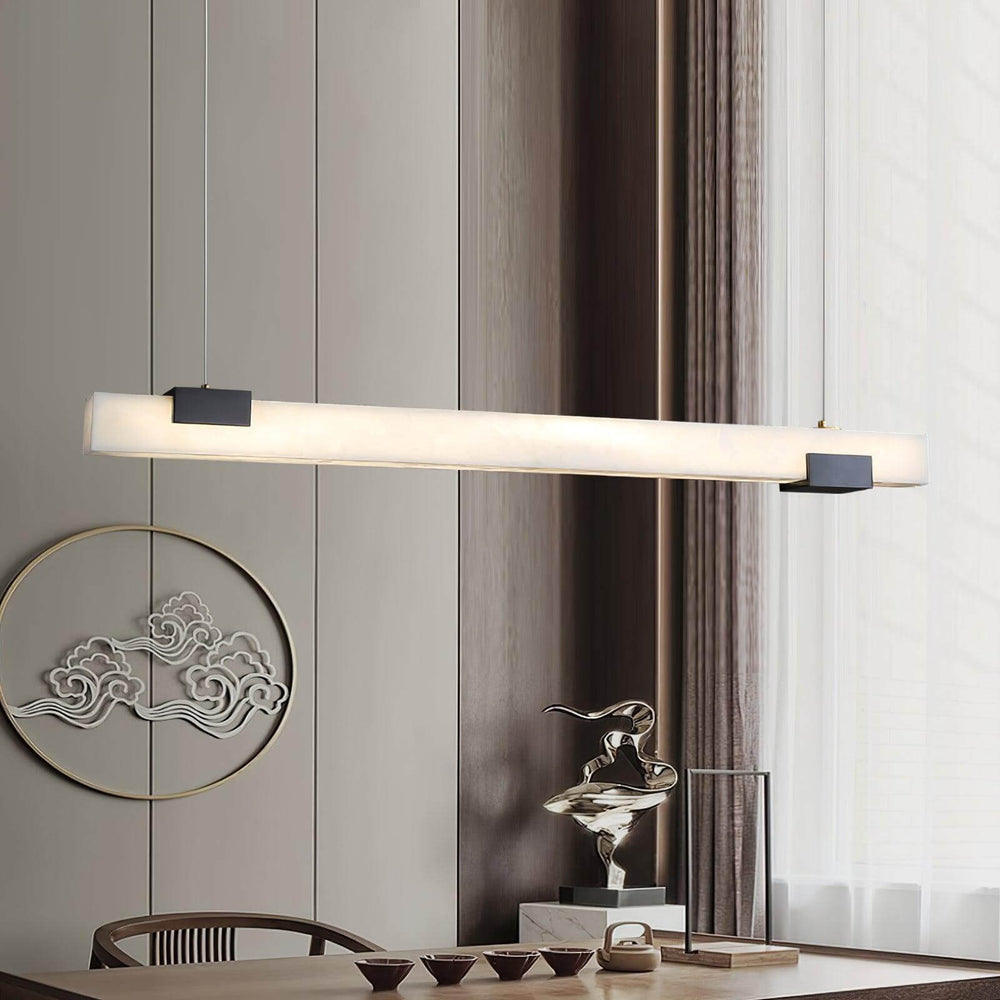 Cary Alabaster Pendant Light in contemporary kitchen setting, showcasing linear pendant lighting design.
