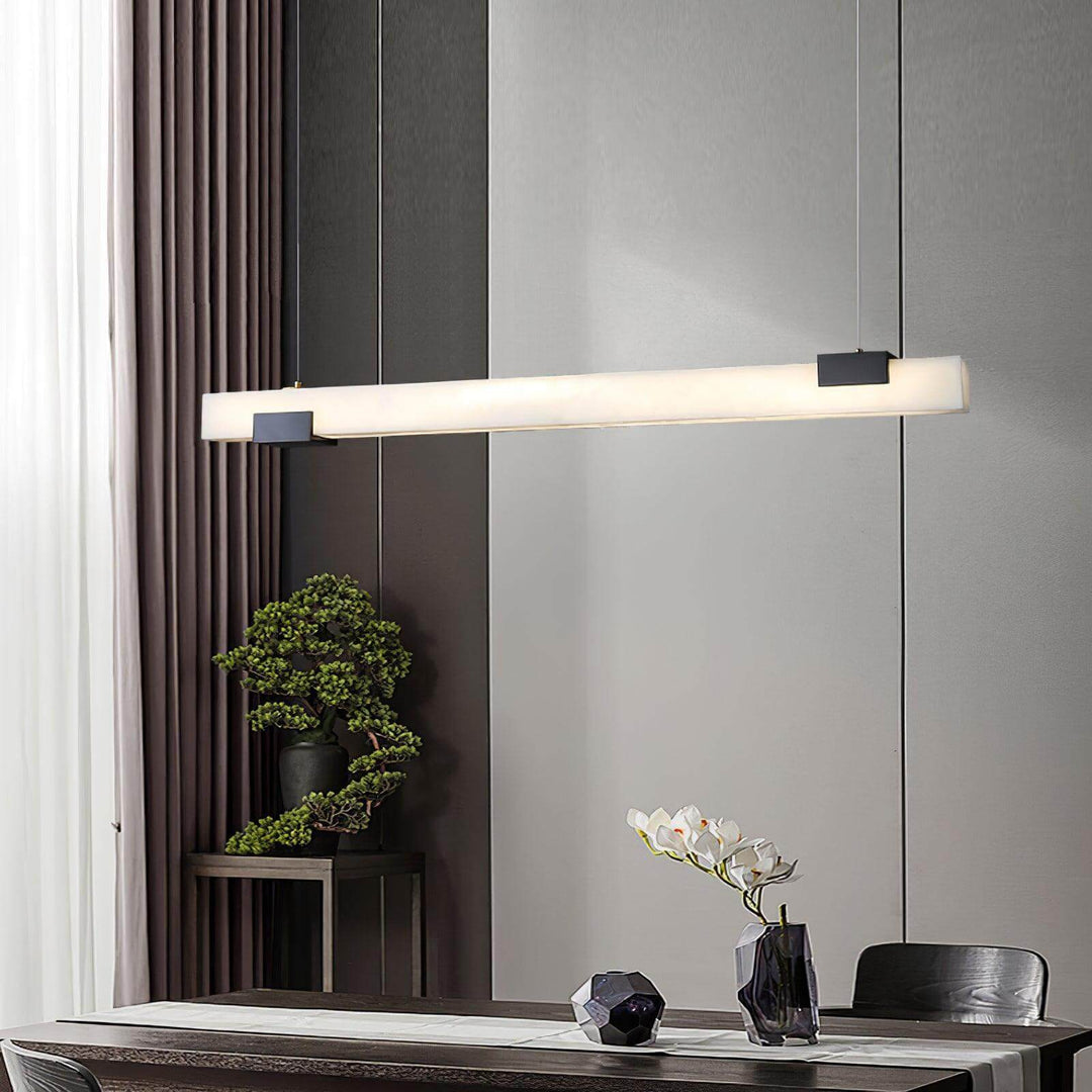 Cary Alabaster Pendant Light in contemporary dining setup, showcasing linear design and modern elegance.