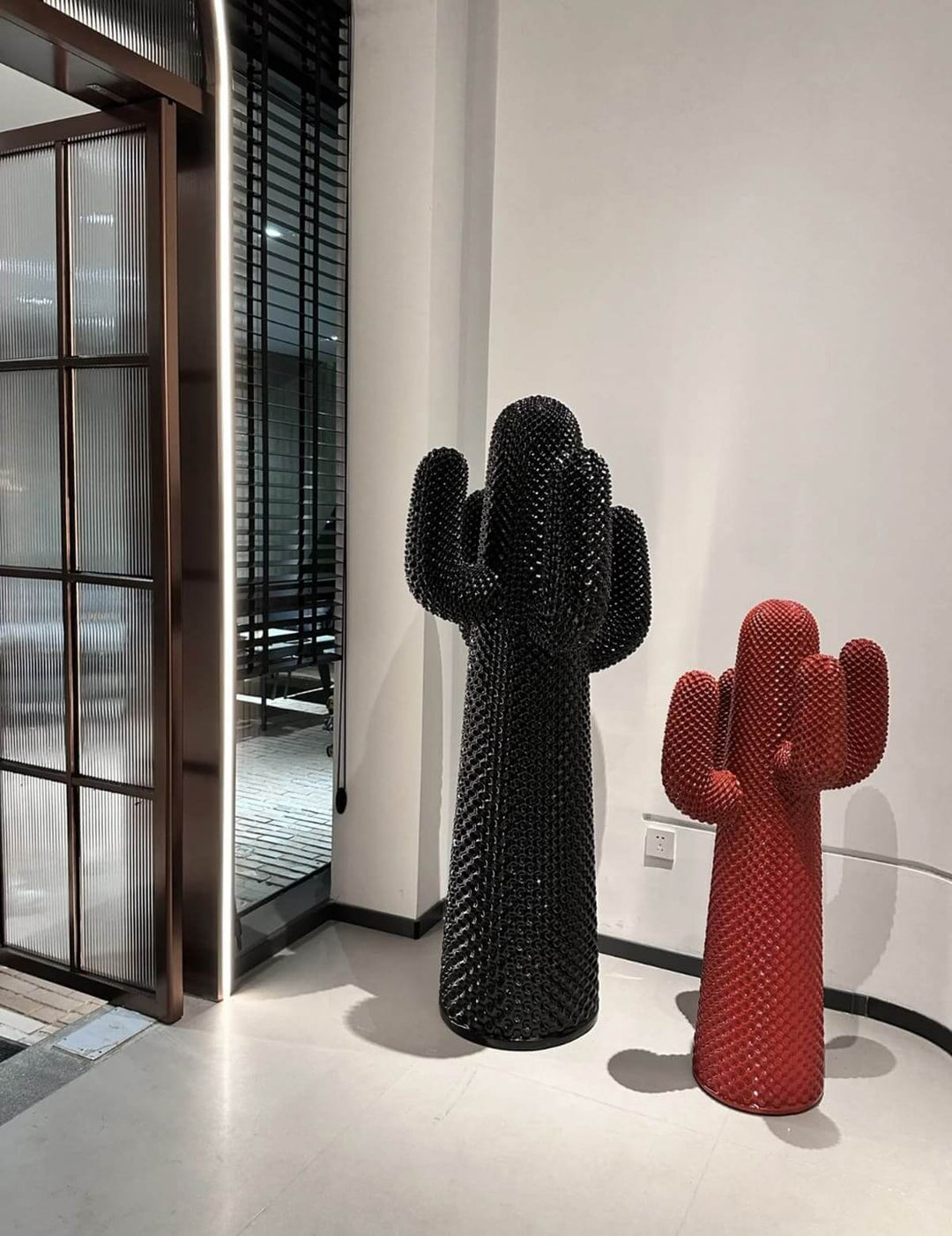 Art deco cactus sculpture floor lamp set in black and red, ideal for stylish living room lighting.