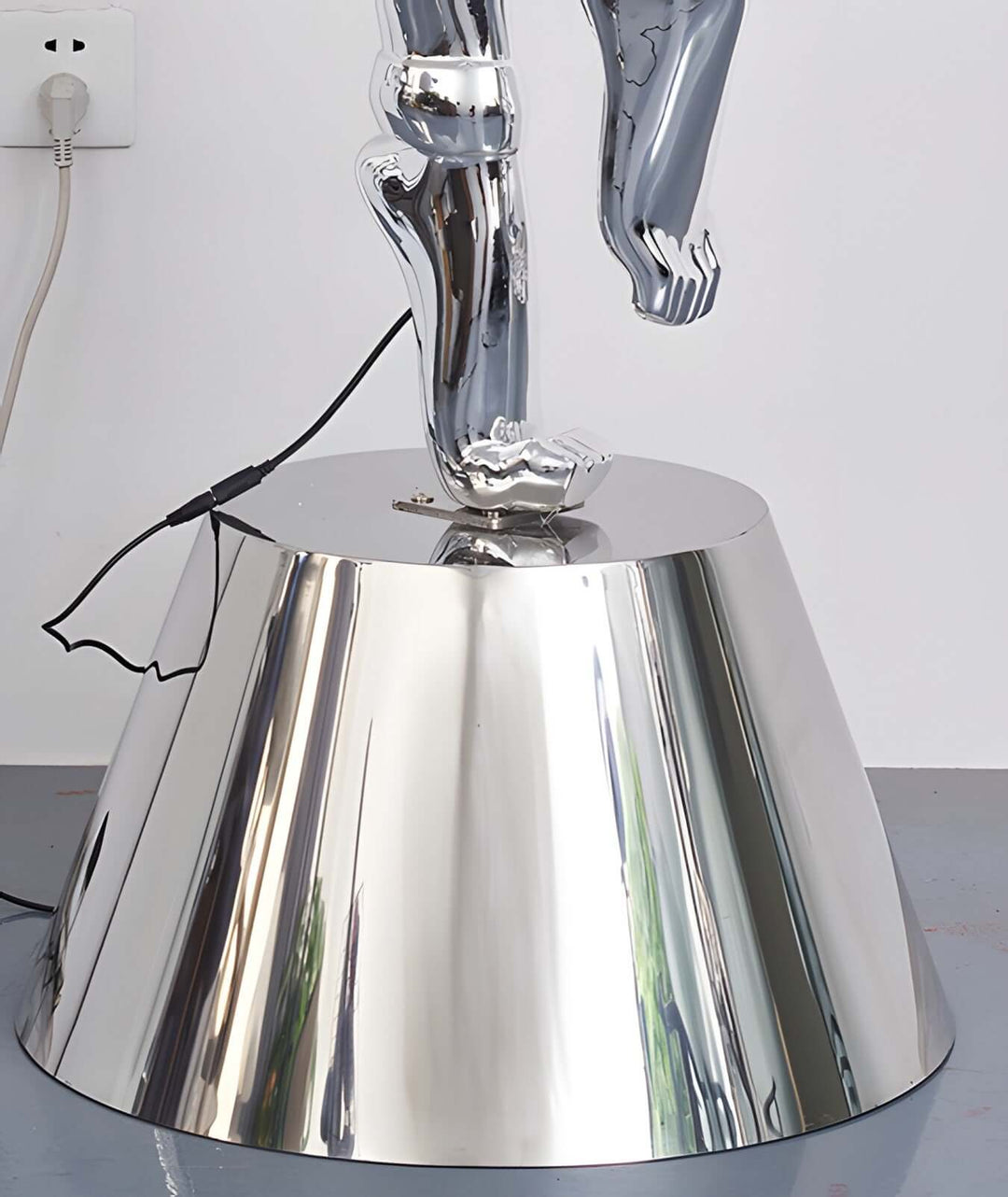 Sculptural Dream Goddess floor lamp base in shiny silver finish, perfect for modern art deco living room decor.
