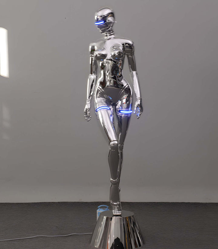 Sculptural Dream Goddess Floor Lamp in chrome finish, showcasing futuristic design ideal for art deco-inspired living spaces.