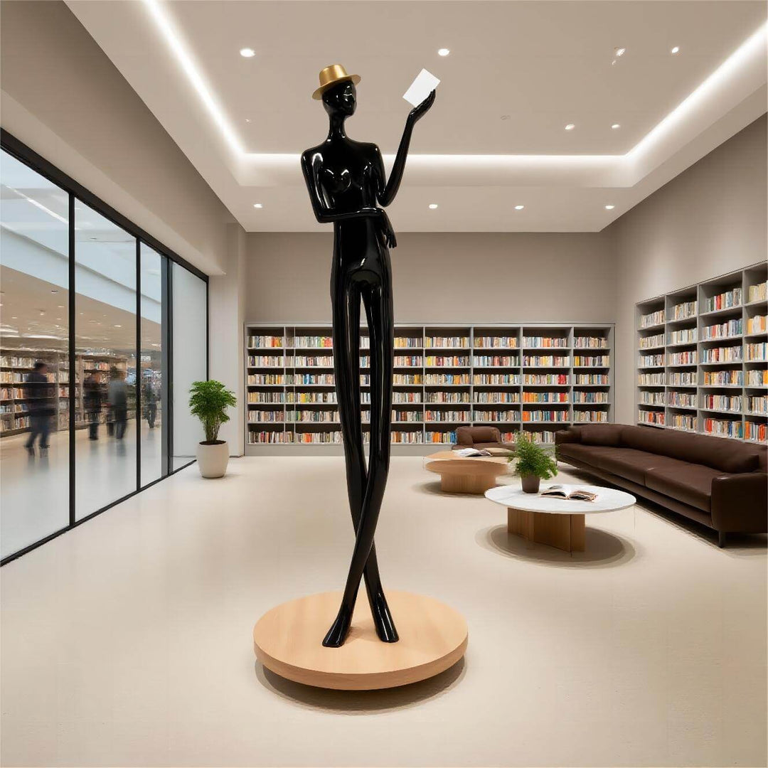 Sculptural floor lamp in modern library, featuring a black mannequin reading with a hat, showcasing art deco style.