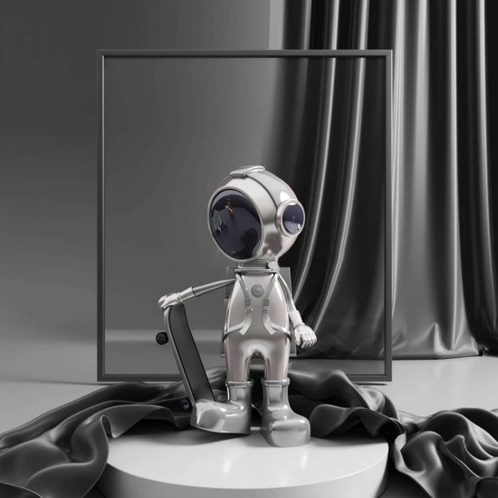 Resin sculpture of a skateboarding astronaut, perfect for modern art decor and living room ornaments.