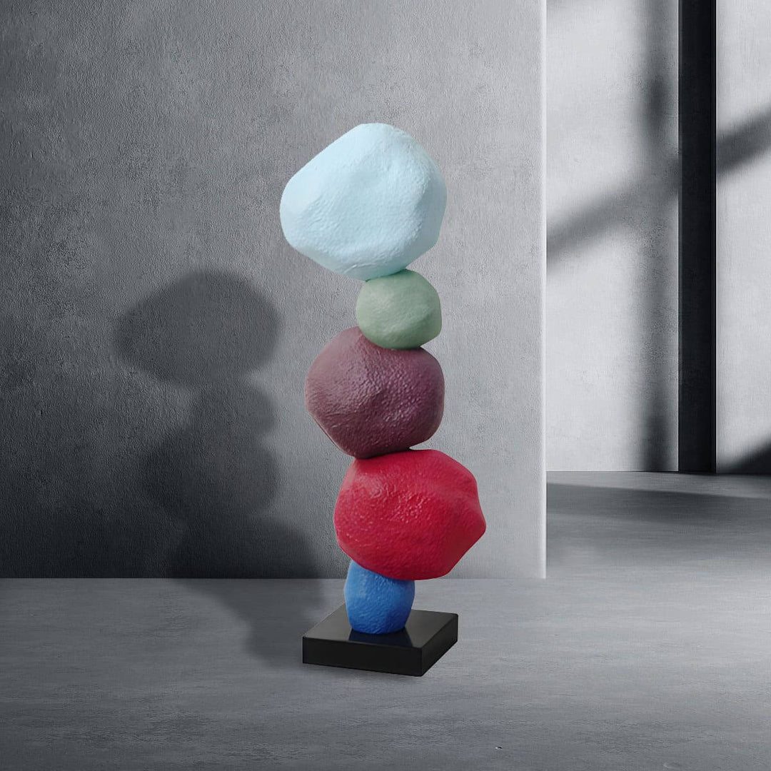 Colorful stacked stone resin sculpture, modern decorative ornament for living room and Art Deco style.