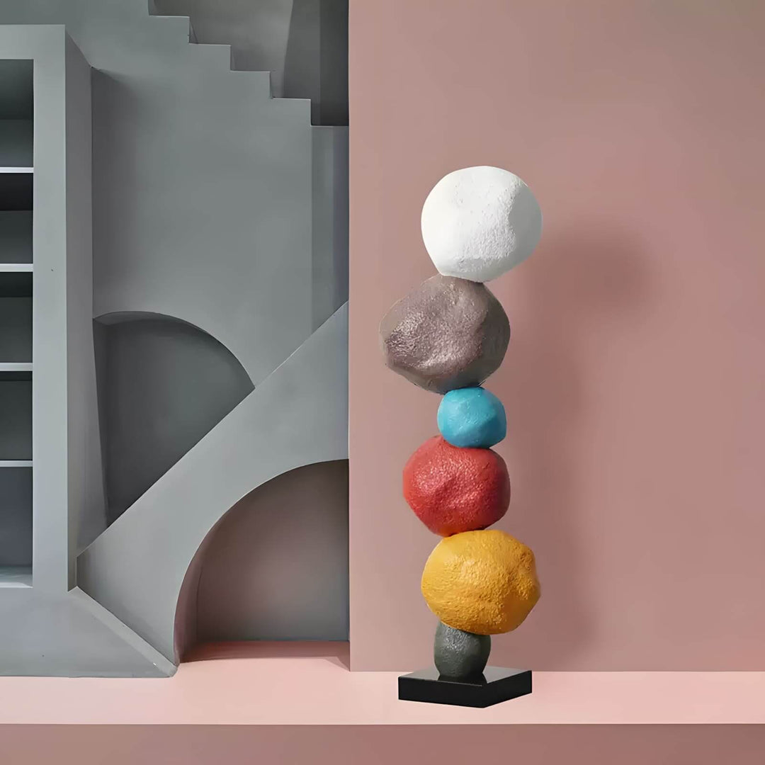 Colorful stacked stone resin sculpture for living room decor, adding a modern Art Deco touch.