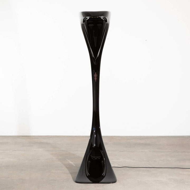 Sculptural Vyntra Floor Lamp in sleek black design, an art deco style floor lamp perfect for living room lighting.