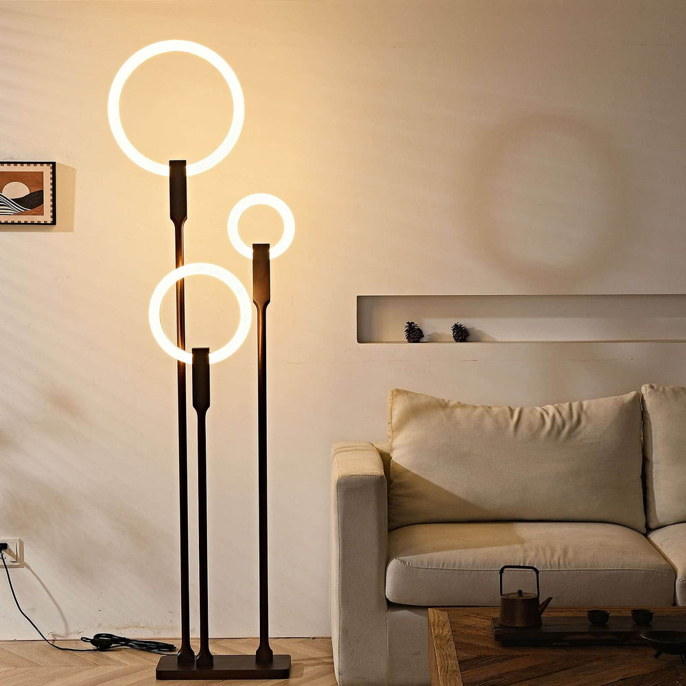 Zereen unique 3 lamp floor lamp in brown, stylish addition for bedroom or living room decor.