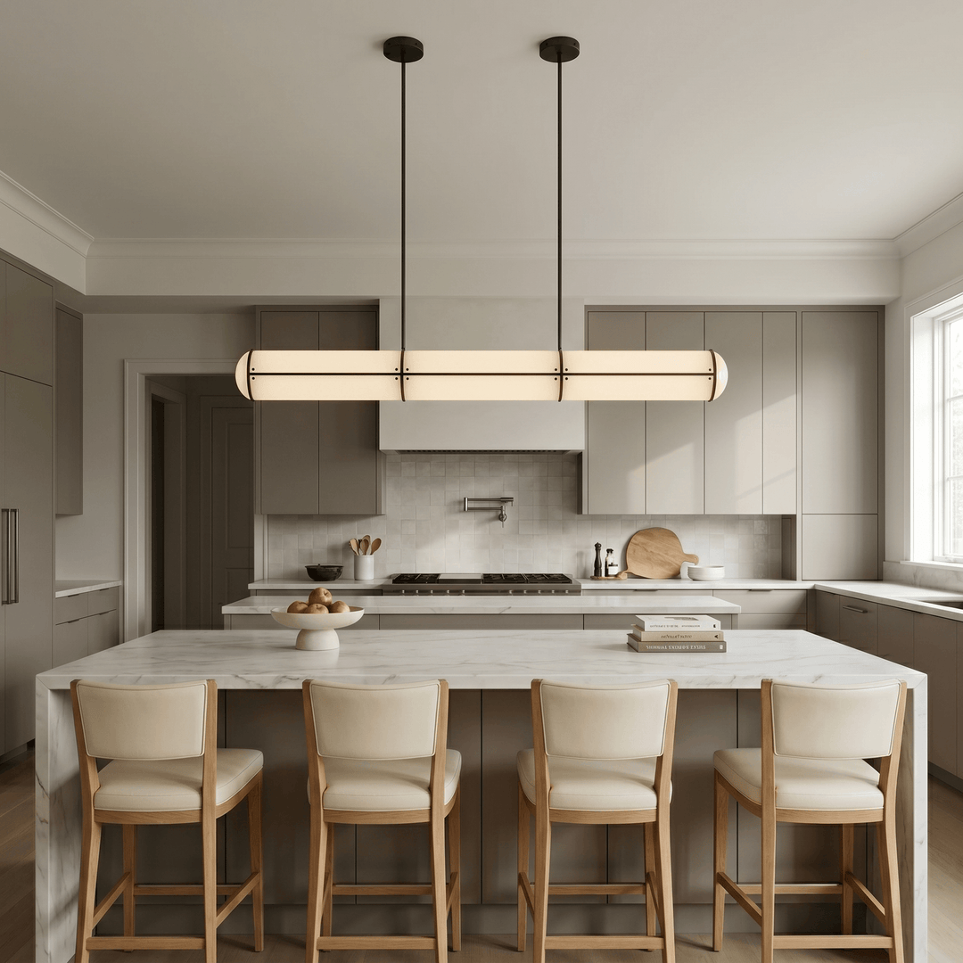 Black Acrylic Endless linear pendant light centered above a marble island in a modern gray kitchen