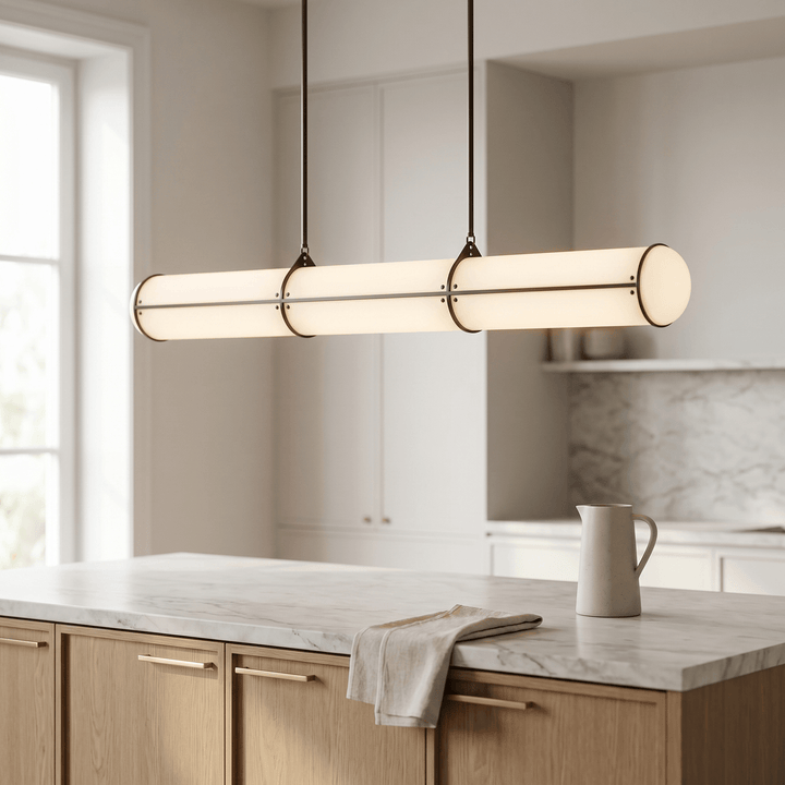 Angled view of the black Acrylic Endless kitchen island pendant light in a bright contemporary kitchen