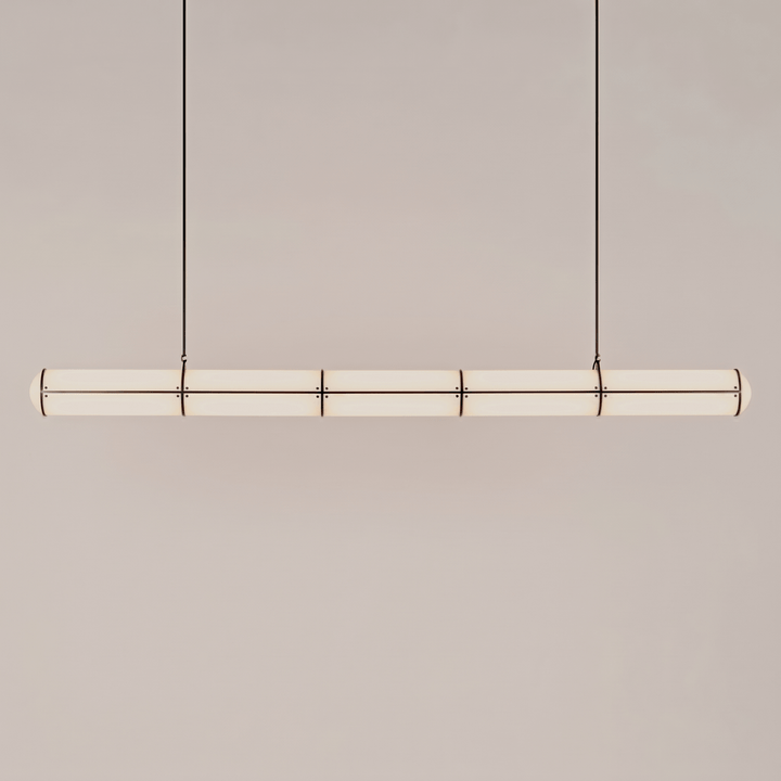 Long black Acrylic Endless linear pendant light with a glowing segmented acrylic diffuser