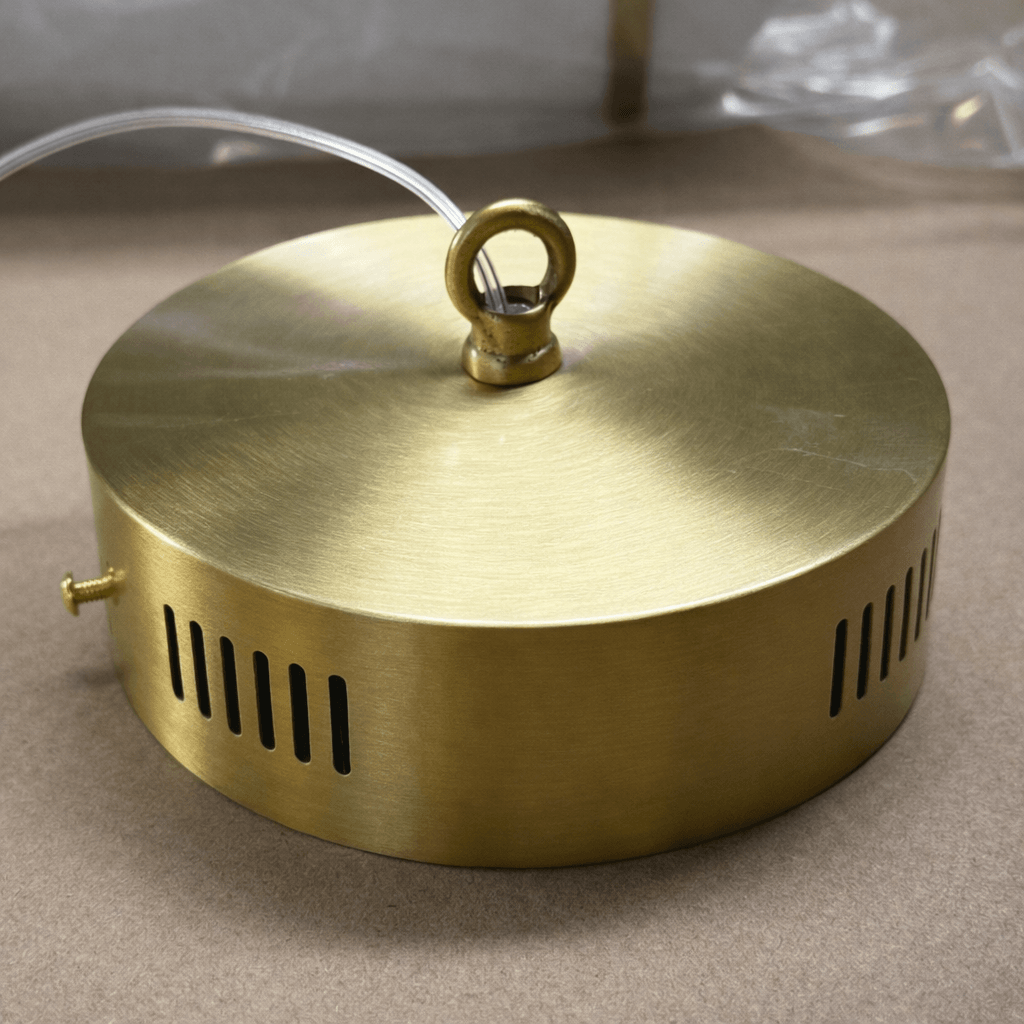 Brushed brass ceiling canopy for the Acrylic Endless Pendant Light with ventilation slots and wiring