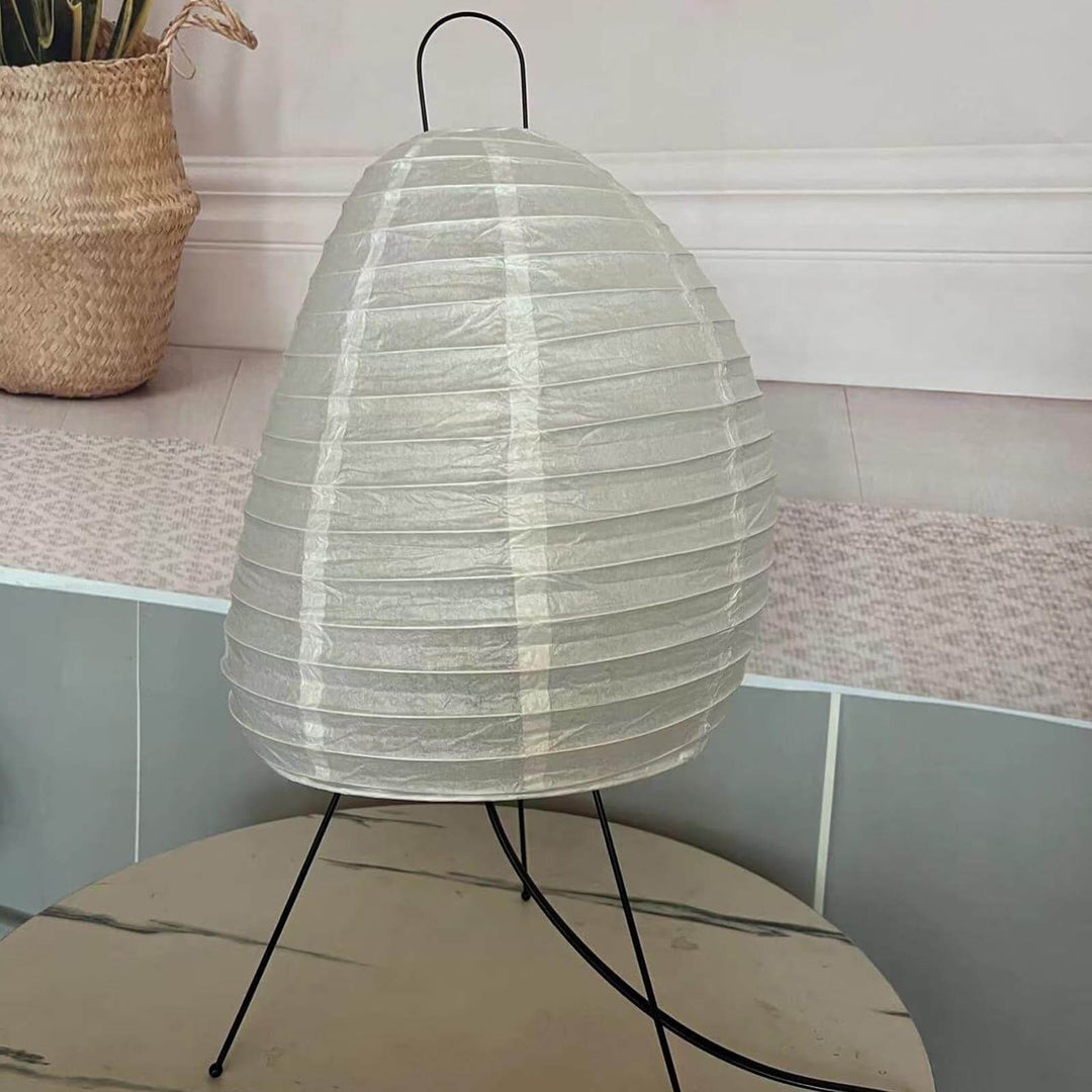 Unlit Akari 1N Table Lamp displaying its white paper shade and black power cord