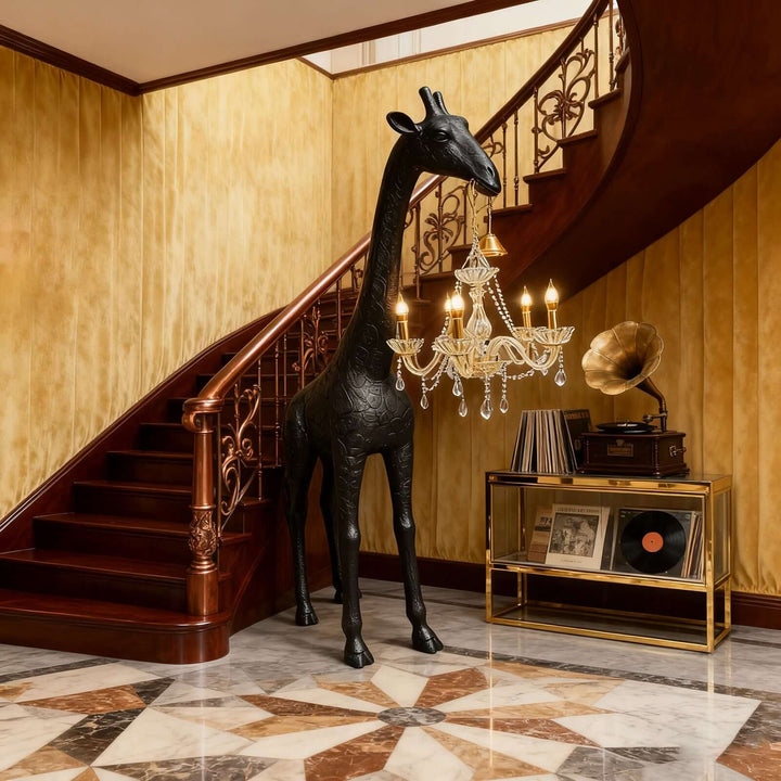 Black giraffe crystal floor lamp displayed in a grand foyer with a curved staircase