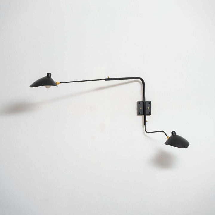Wide black two-light adjustable wall sconce with long asymmetrical arms