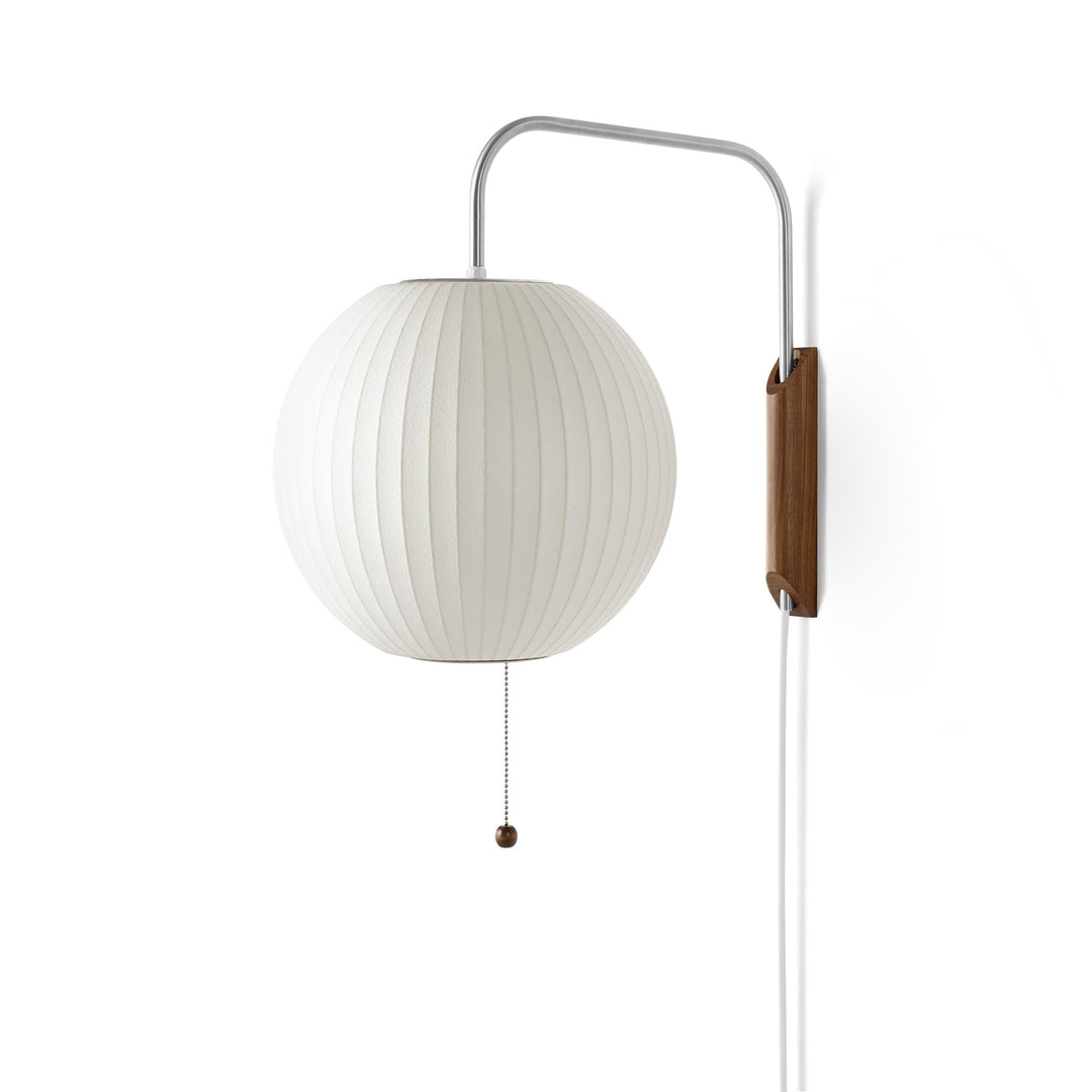 Globe Bubble Ball wall sconce with a white ribbed shade and walnut base on a white background