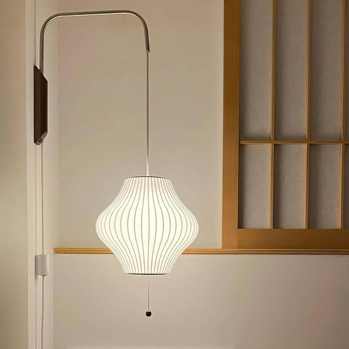 Lantern-shaped Bubble Ball wall sconce beside a wood-framed screen in a Japanese-style interior
