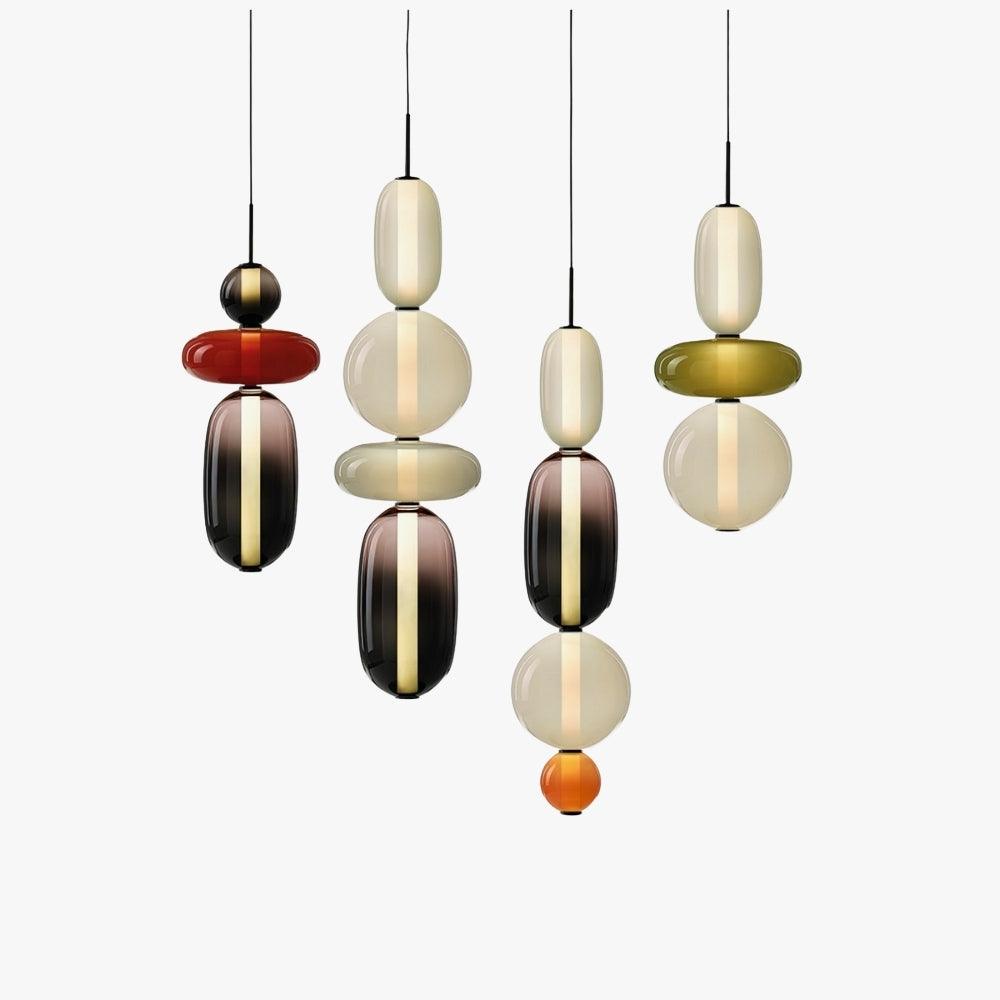 Candied colorful glass pendant lights in red, green, smoked and cream glass