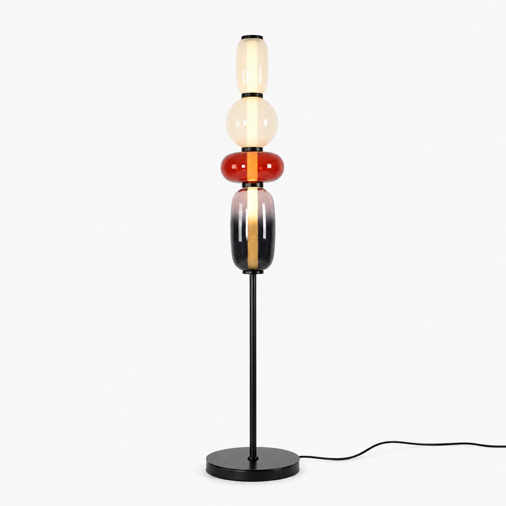 Candied Glass Floor Lamp Model A Red with stacked cream, clear, red, and smoky glass shades on a black base.