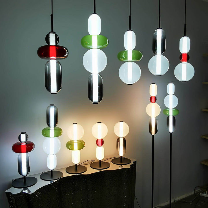 Model A LED table lamp with champagne glass globe, smoked oval body and black circular base