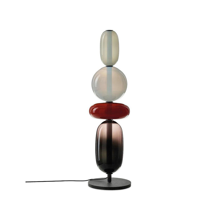 Model F glass table lamp with champagne globe, red rounded disc and smoked oval lower body
