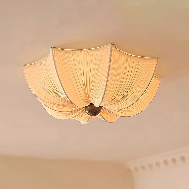 Dia 19.7-inch Feynar fabric and wood ceiling light shown illuminated from below