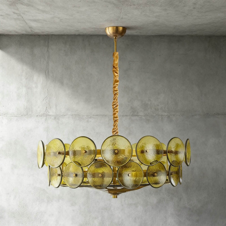 Front view of a green glass chandelier with two rows of textured circular discs