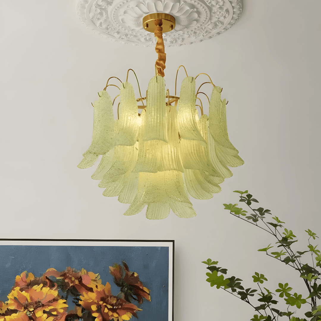 Pale green Murano glass chandelier with layered flared panels above framed artwork