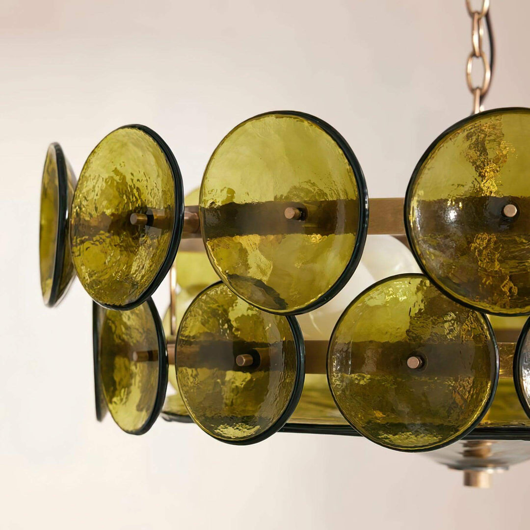 Close-up of green circular glass panels on the Lorenzo chandelier