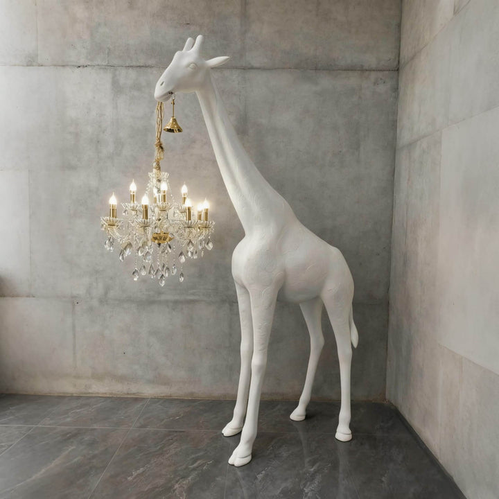 Large white and gold giraffe floor lamp with a multi-arm crystal light