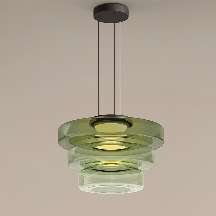 Green three-layer glass pendant light with graduated translucent shades and integrated LED