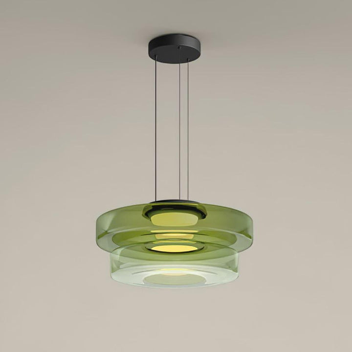 Green two-layer glass pendant light with stacked translucent shades and black suspension