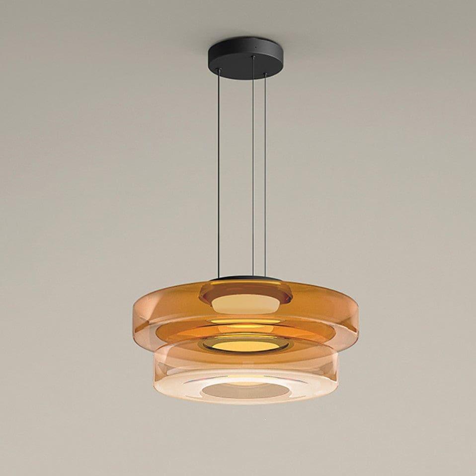 Orange two-layer glass pendant light with layered circular shades and warm integrated LED