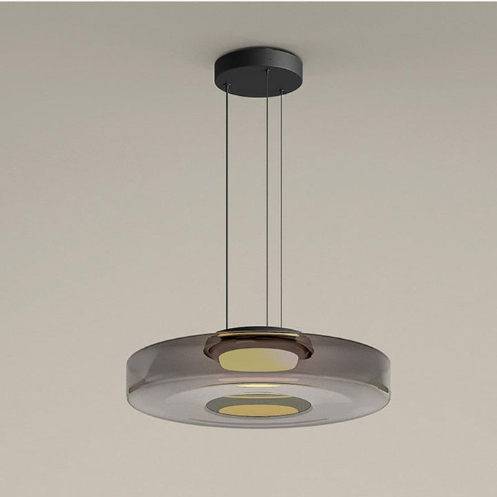 Smoke Grey one-layer glass pendant light with round disc shade and black ceiling canopy