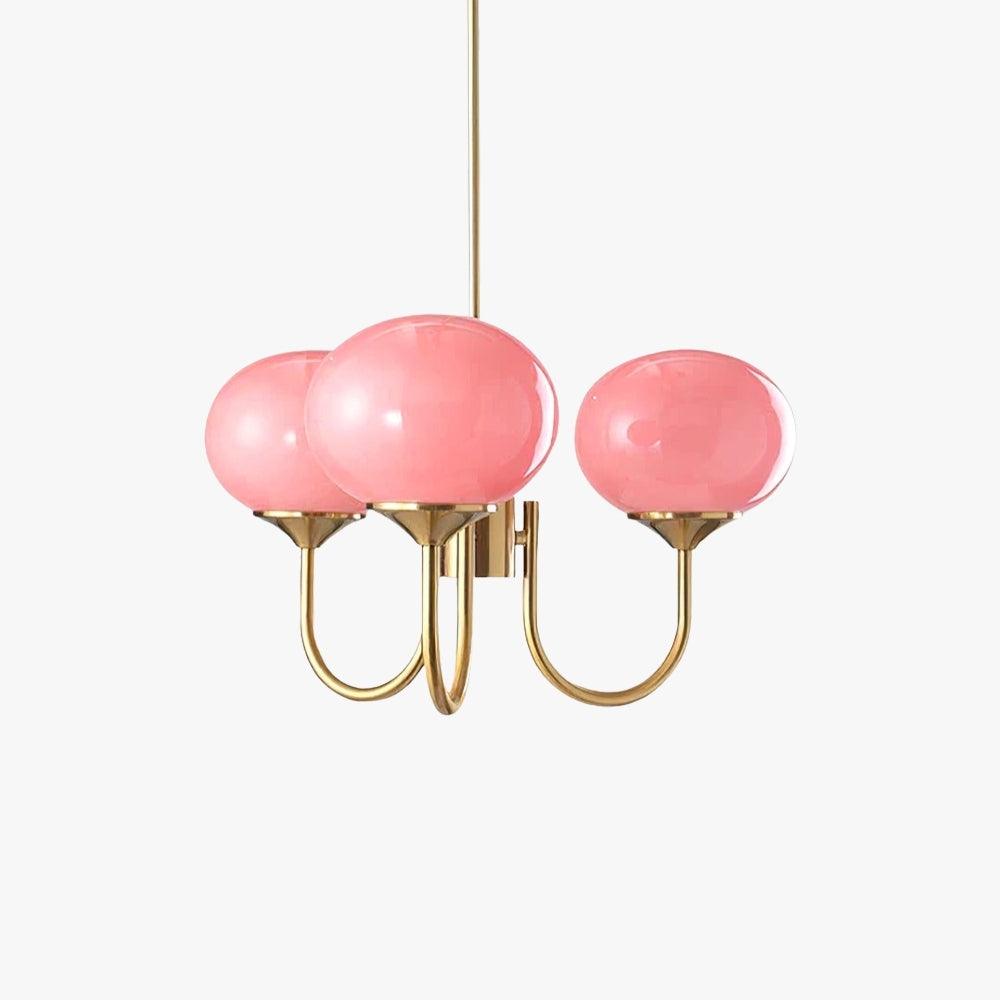 Marshmallow three-light pink glass chandelier with a warm copper finish on a clean white background.
