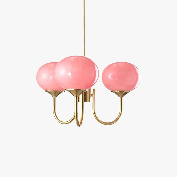 Marshmallow three-light pink glass chandelier with a warm copper finish on a clean white background.
