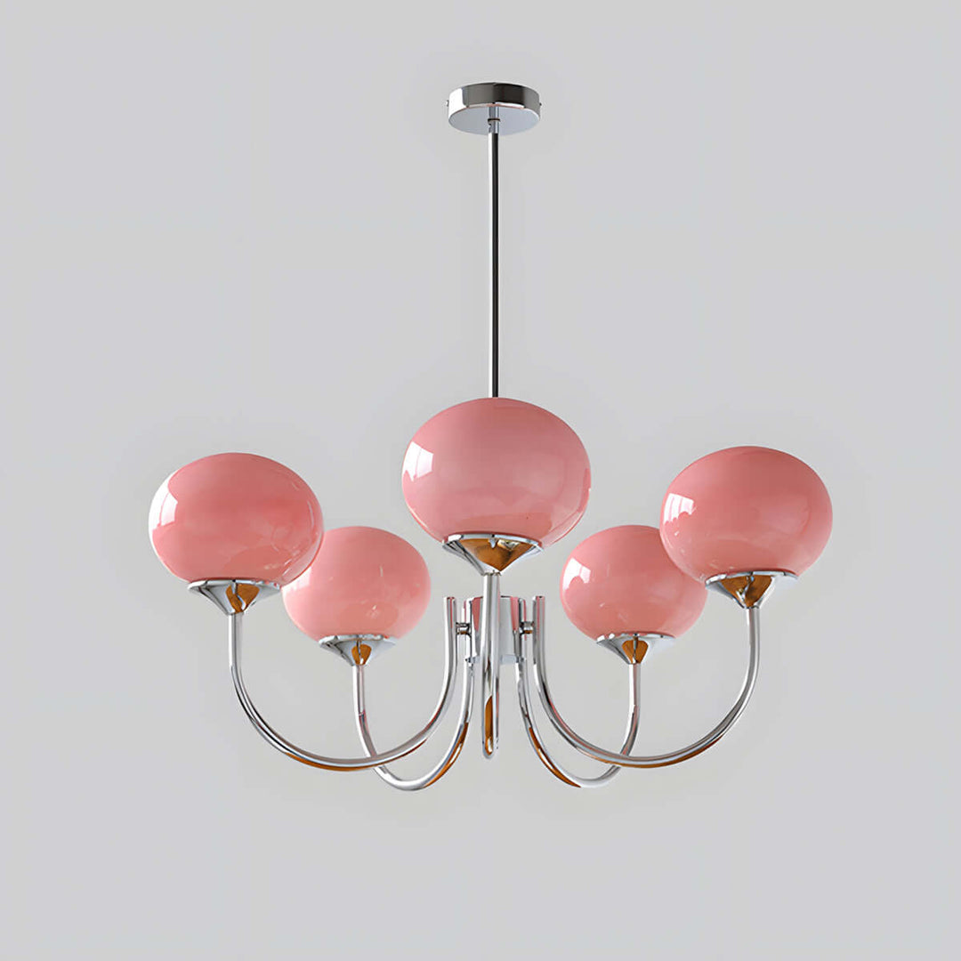 Five-light Marshmallow chandelier with a chrome frame and pink glass globes.