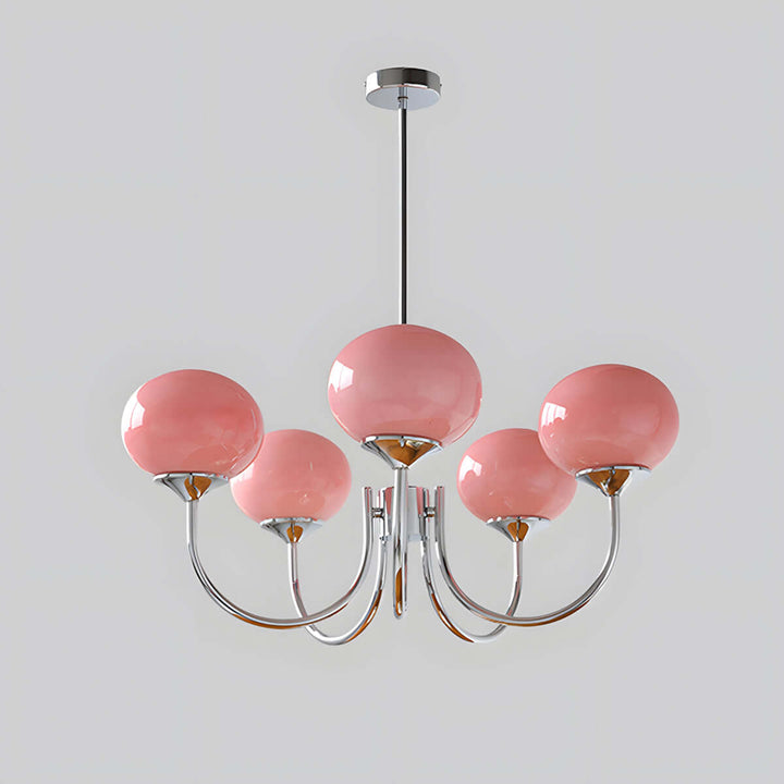 Five-light Marshmallow chandelier with a chrome frame and pink glass globes.