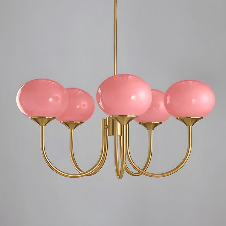 Close product view of the five-light copper and pink glass Marshmallow chandelier.