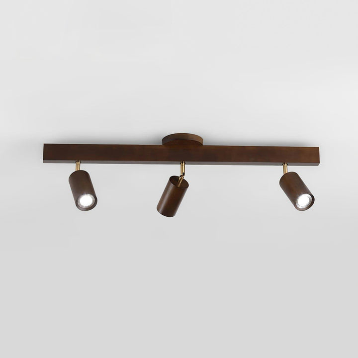 Three-head Merlo walnut wood track lighting with individually adjustable spotlights in a front product view
