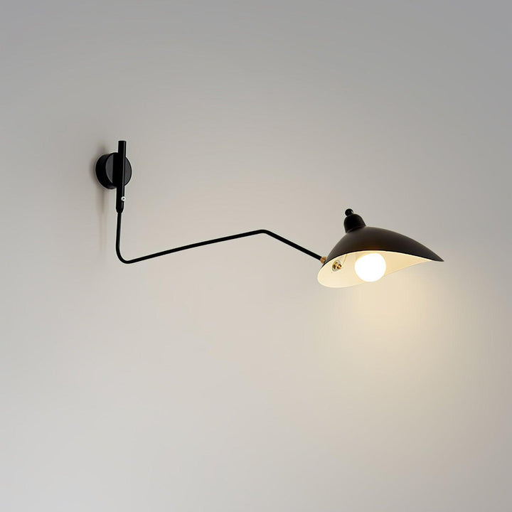 Modern black adjustable wall light with one cone shade and warm exposed bulb