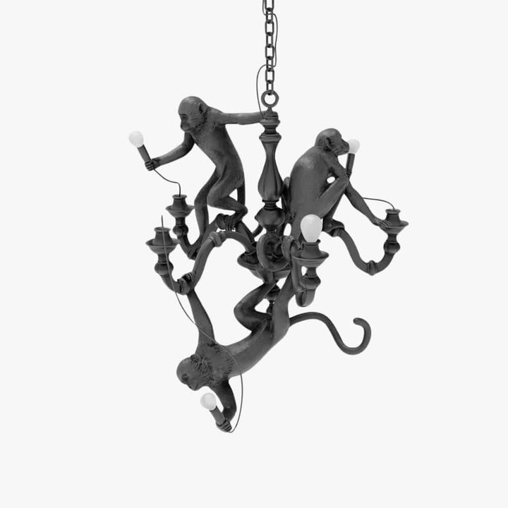 Black Monkey Chandelier with three sculpted resin monkeys and exposed bulbs on a white background
