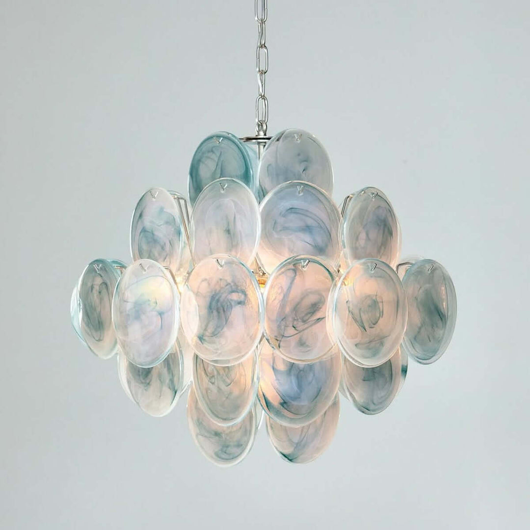 Pale blue Murano Disk Chandelier with layered iridescent glass discs on a light background