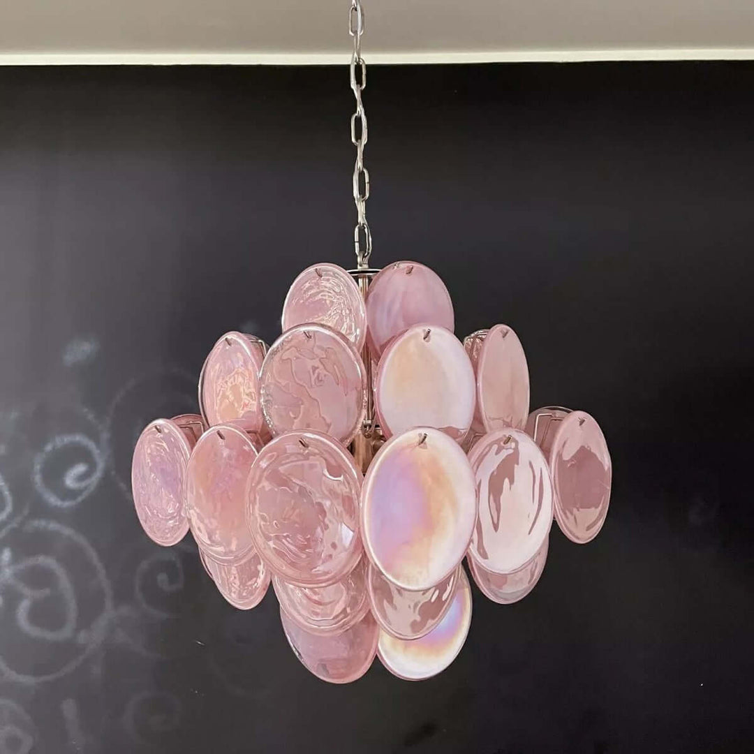 Unlit pink Murano Disk Chandelier showing layered textured glass discs from an angled view