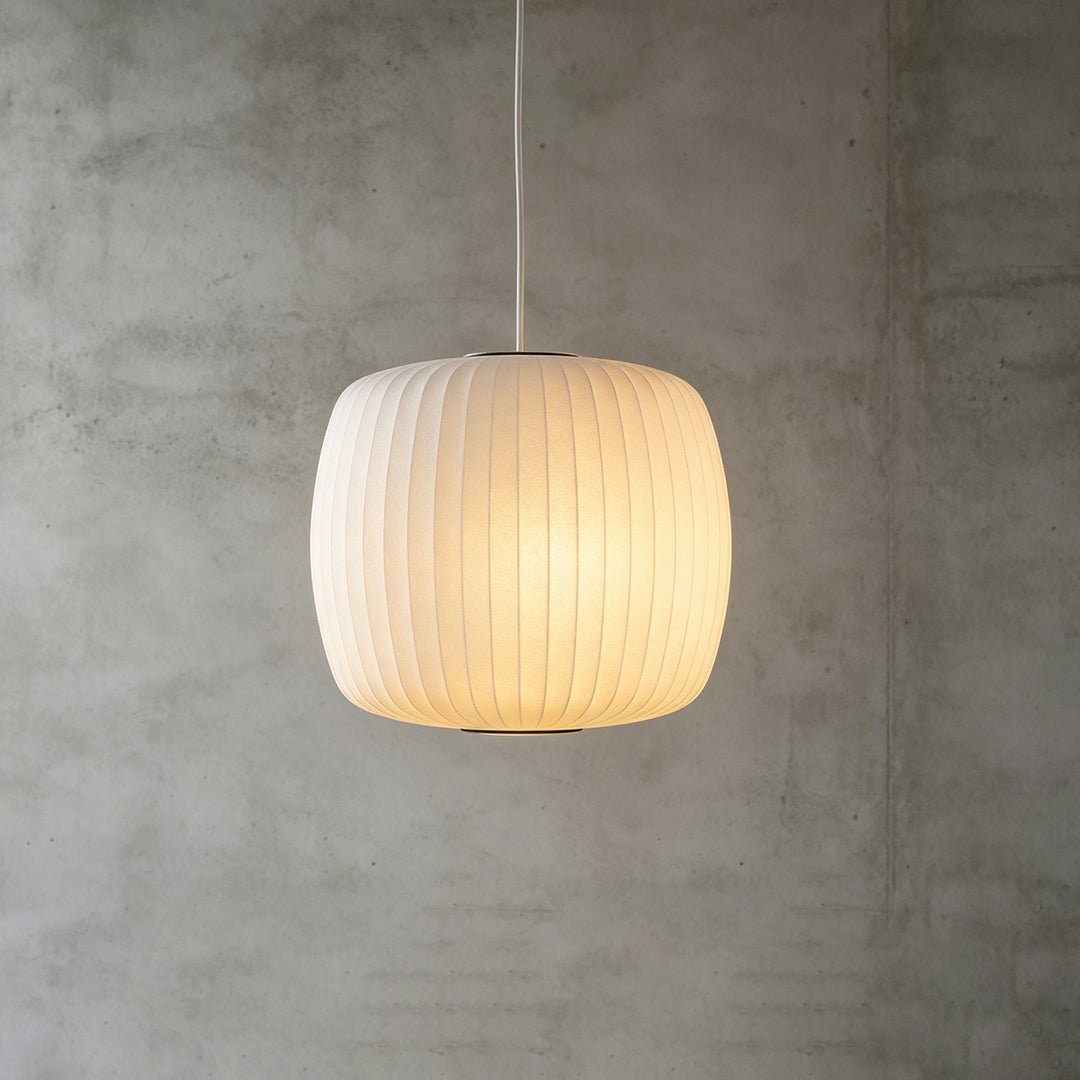 Rounded square Nelson Bubble pendant light with vertical silk panels and warm diffused illumination