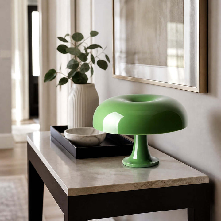 Green Nesso Table Lamp displayed on a marble-top entryway console
