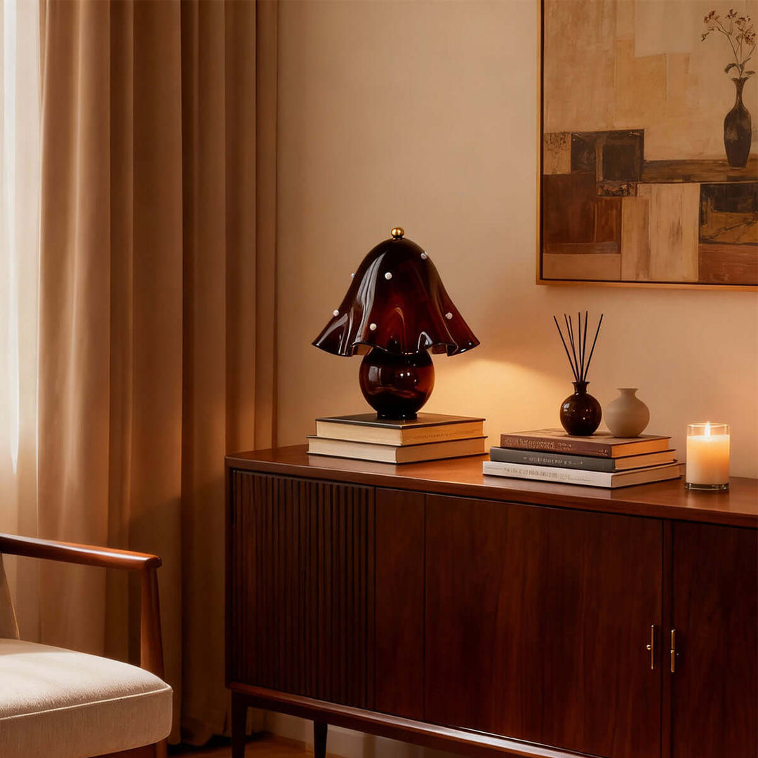 Spotted brown flower table lamp displayed on a vintage wood living room sideboard