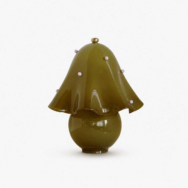 Novrae spotted green glass table lamp with sculptural flower shade and round base