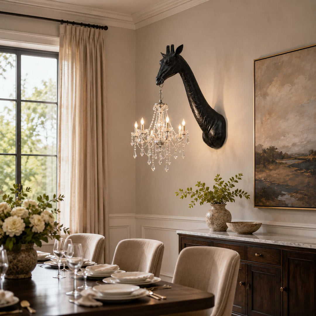 Black Nuvexa giraffe wall lamp with an illuminated silver crystal chandelier in an elegant dining room